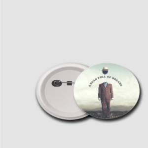 Badge (75mm) – A Head Full of Dreams | Surreal Floating Head Design